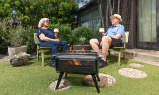 Couple enjoying a backyard fire with BioLite FirePit+
