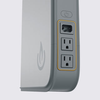 Close-up of the Backup Core fridge battery backup showing three outlets, a power button icon, and a gold accent border on a light gray background.