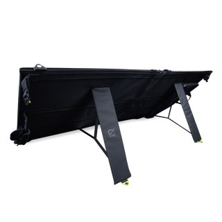 A black portable folding solar panel shown open, with two support stands extended.